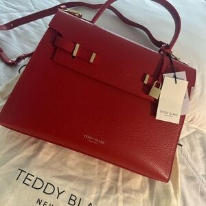 Red Leather Satchel with Gold Accents